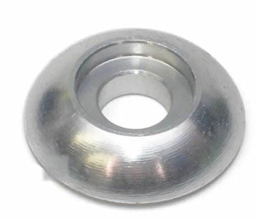The Root Industries IHC Compression Top Cap, made of shiny, metallic material in a conical shape with a central hole, reflects light off its smooth surface and serves impeccably as a replacement top cap for IHC forks.