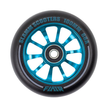 A close-up of the Slamm Flair 2.0 100mm stunt scooter wheel in blue, featuring a black tire with multiple spokes. It has "SLAMM SCOOTERS 100MM 88A" around the rim, "FLAIR" at the bottom, and is equipped with ABEC-9 bearings for smooth skatepark rides.