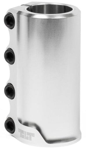 The Tilt Rigid 4 Bolt SCS Stunt Scooter Clamp in Chrome Silver is a lightweight clamp made from forged 6061 T6 Aluminium. It features a cylindrical design with the brand name "Tilt" engraved at its base and includes four black bolts on the side for secure attachment.